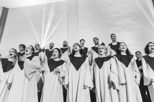 Black and White Photo of a Choir Singing 