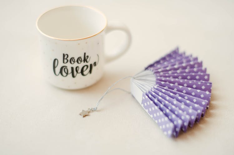 Mug And A Paper Fan