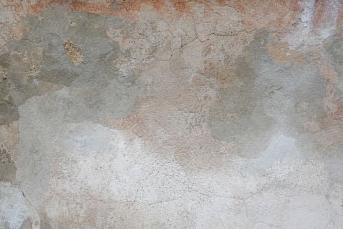 Free Wall Surface with Cracked Old Plaster Stock Photo