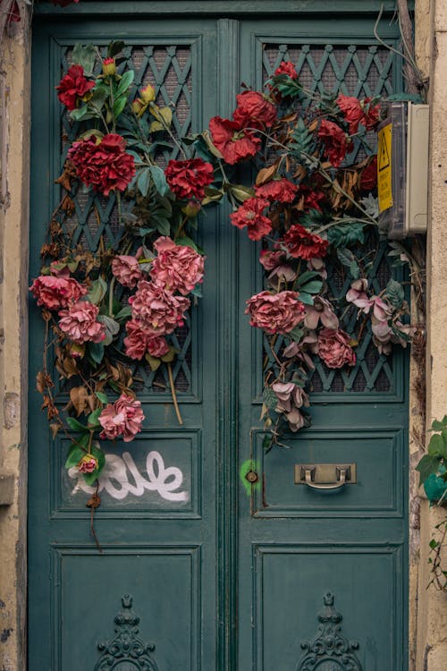 Photo of a Door Decorated with Roses