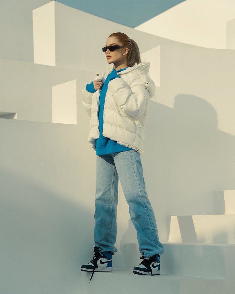 Woman Standing In White Jacket