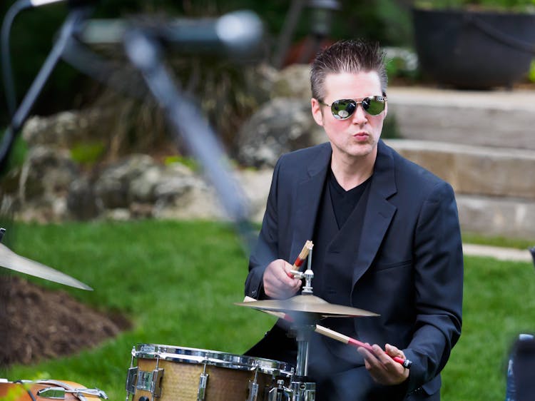 A Drummer Wearing A Blazer