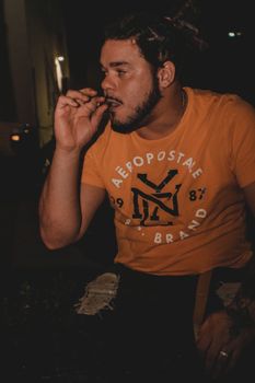Photo of Man Smoking Blunt