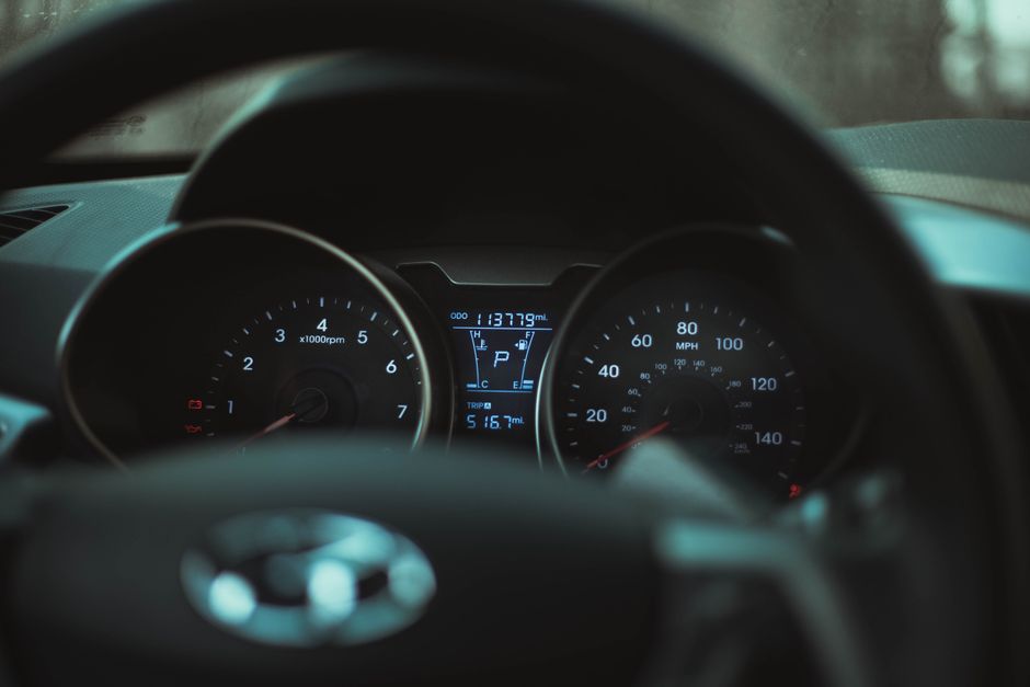 Odometer showing mileage limit in a rental car