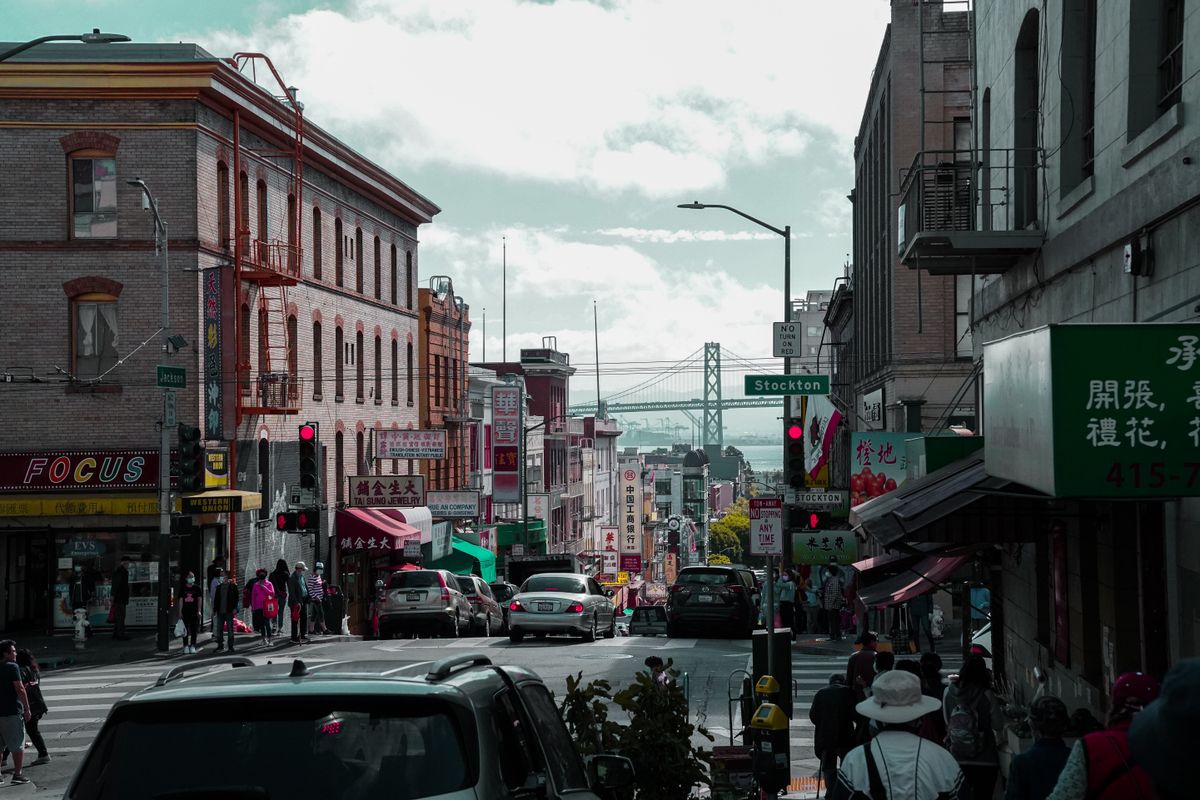 Street photography of pedestrians and shops in Chinatown, San Francisco