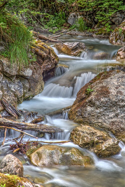 Clear Running Water in the Middle of Brown Stones