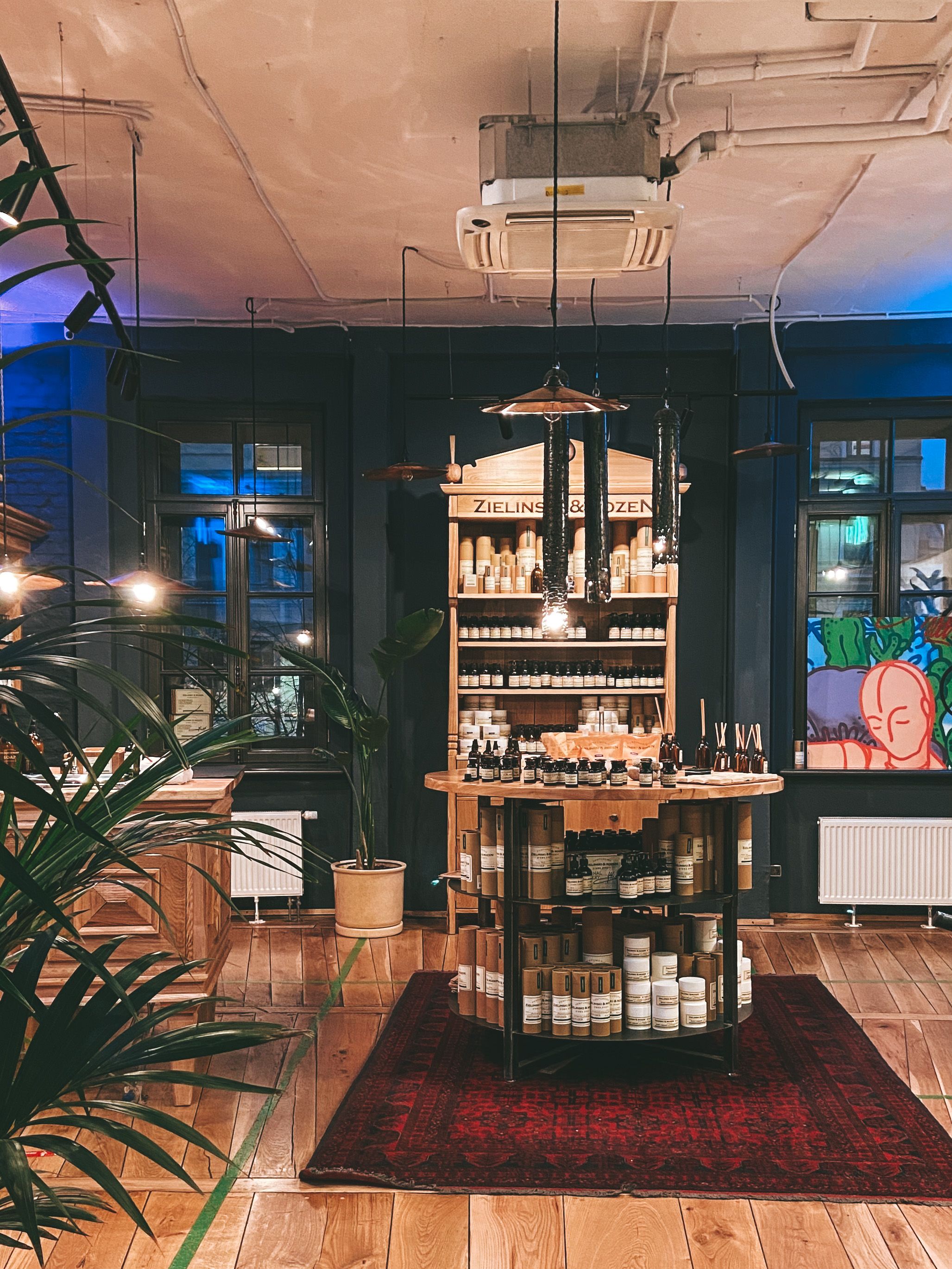 Charming interior of a cosmetic store in St. Petersburg with elegant lighting and decor.