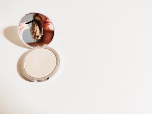 Free Compact Powder On White Surface Stock Photo