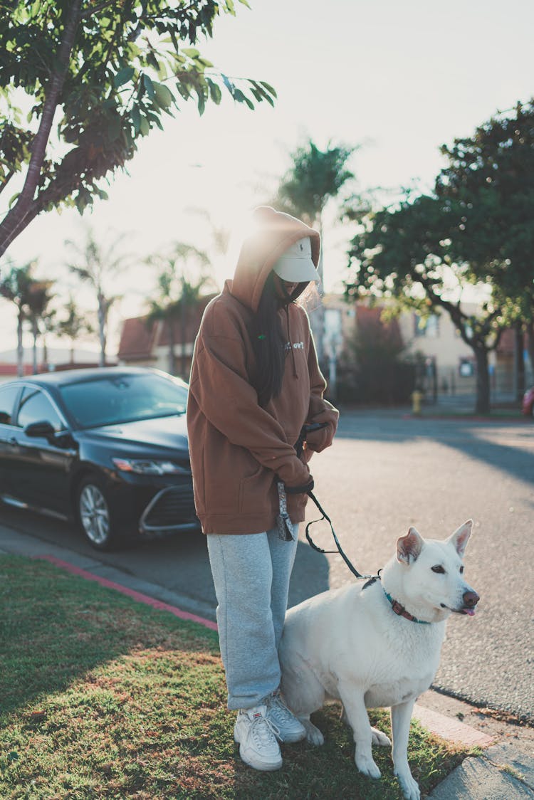 Woman With Dog On Leash