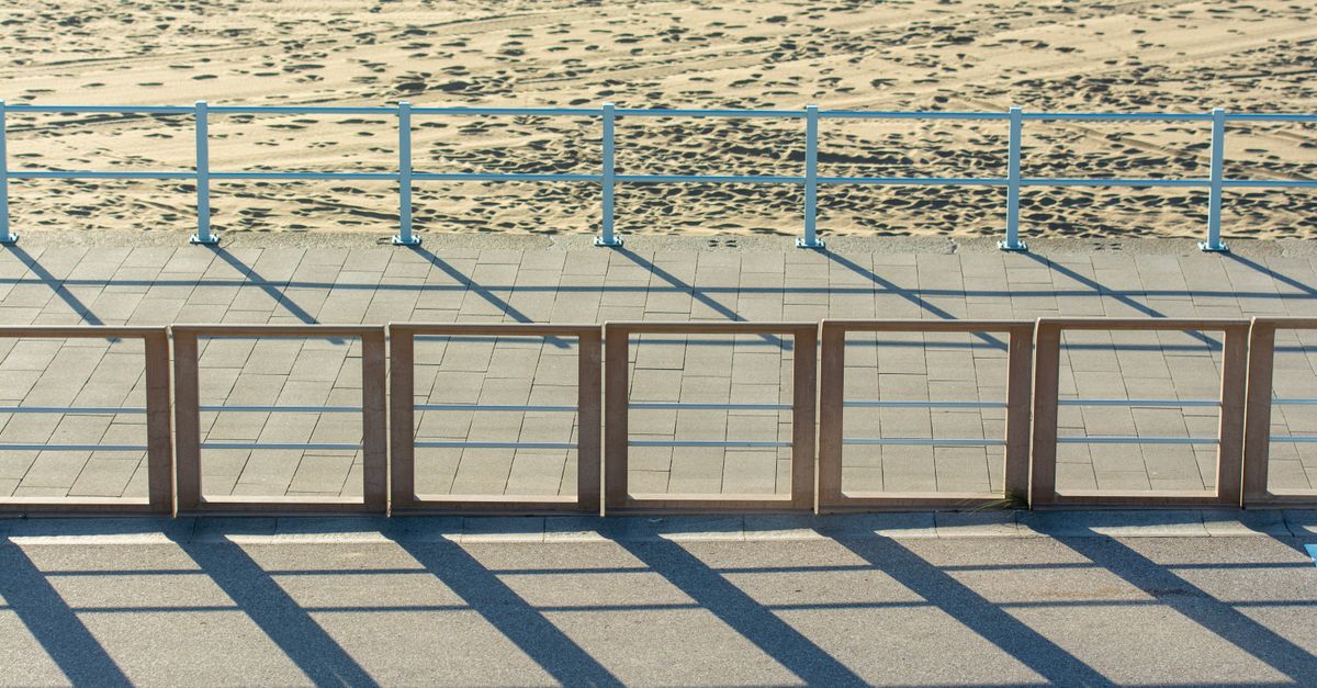 Pavment Railing Railings on Empty Pavement on Beach · Free Stock Photo