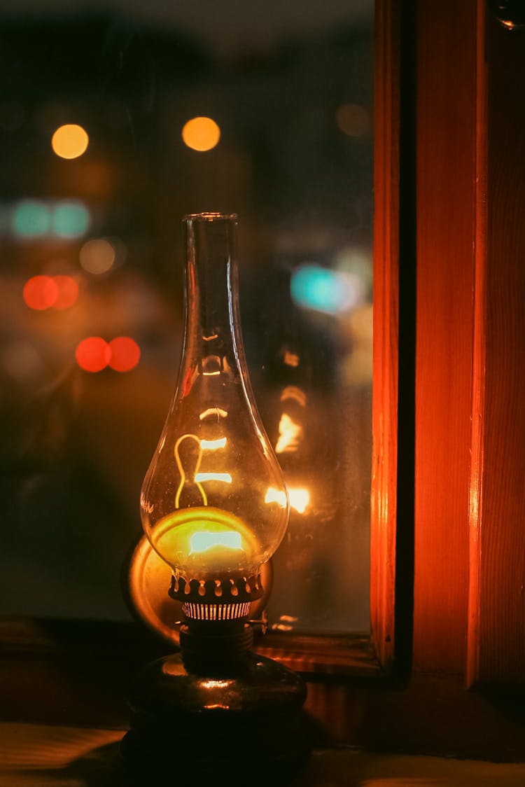 Light Bulb And Window At Night
