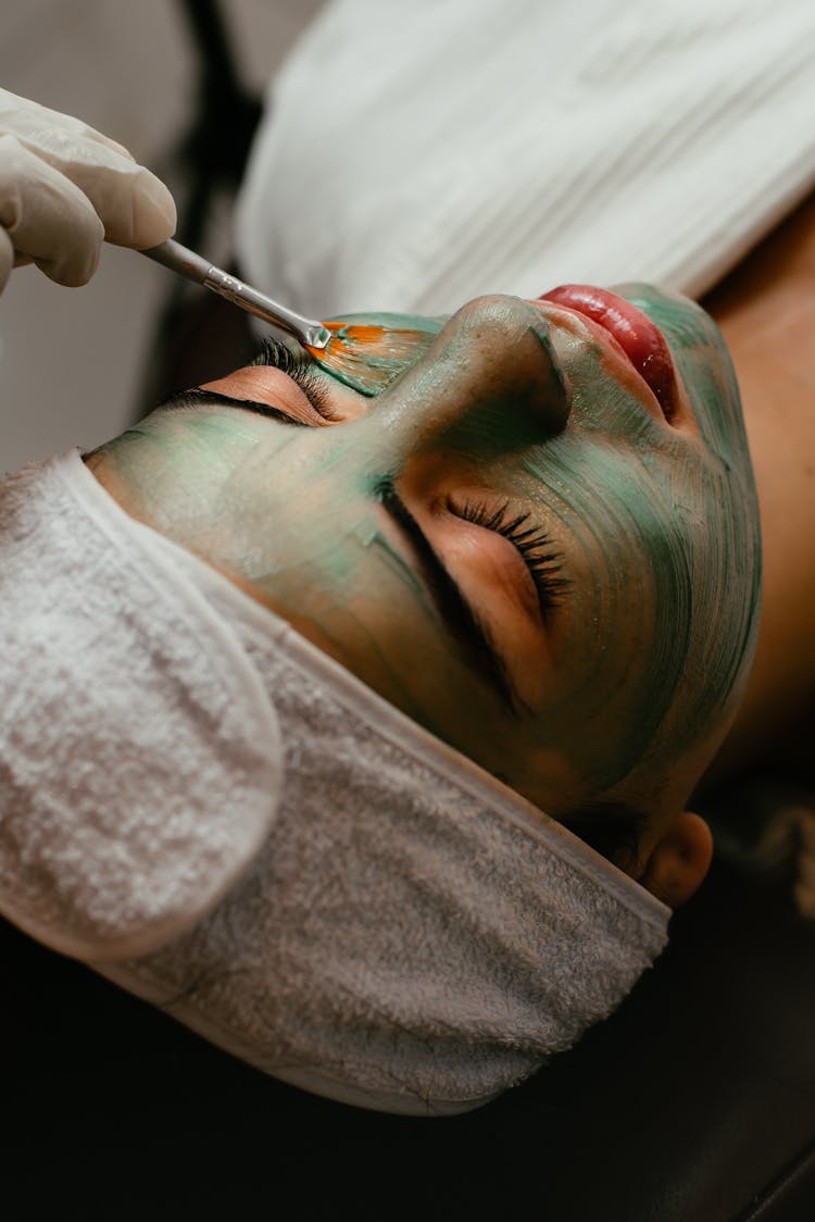 Woman Getting A Face Treatment