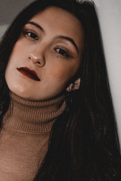 Young Brunette Wearing a Dark Red Lipstick 