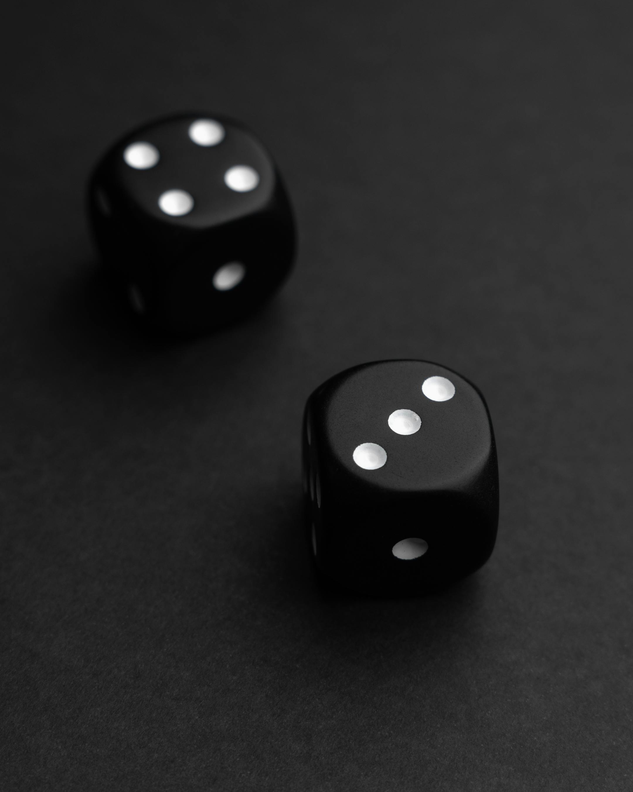 Pair of Black and Red, Golden Metal Dice Against Dark Background. Role  Playing, Casino or Board Game Concept. Generative AI Technology. 25162487  Stock Photo at Vecteezy