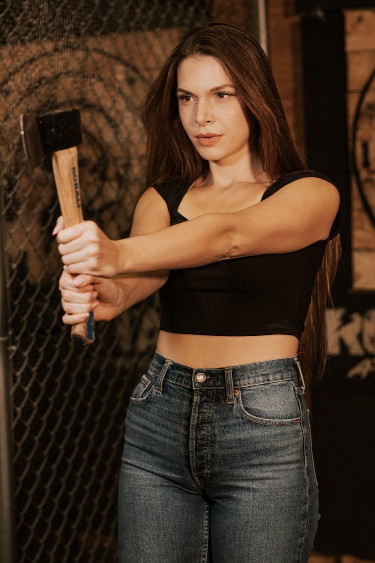 Beautiful Woman Holding An Axe