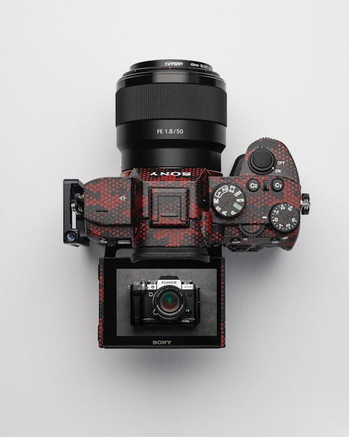 Free Top View of a Digital Camera with a LCD Screen Opened Stock Photo