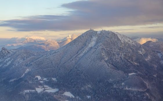 Stunning aerial view of snow-capped mountains in Salzburg, Austria during winter.
