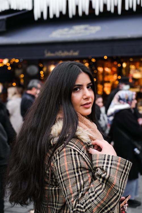 Young Brunette Woman in City 