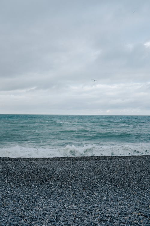 bulutlu, deniz, deniz manzarası içeren Ücretsiz stok fotoğraf