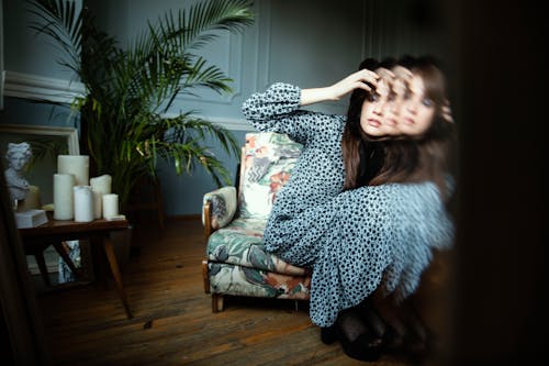 Blurred Woman on Armchair