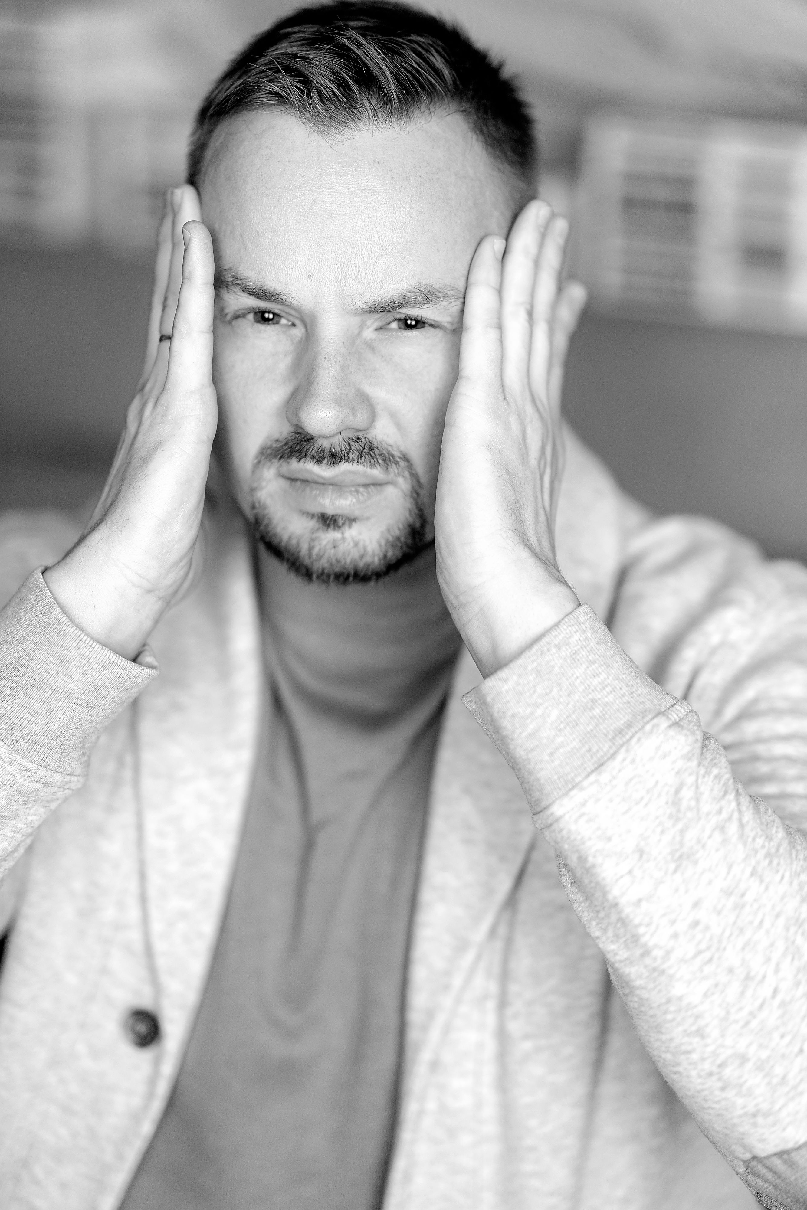 Black and White Photo of Man with His Hands on His Face · Free Stock Photo