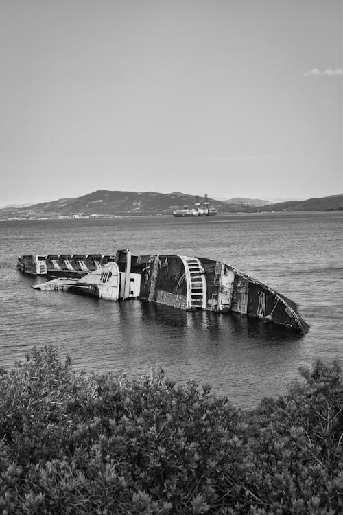 Tilted Ship on the Beach Bay