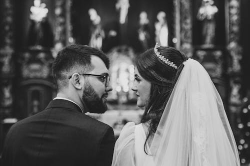Grayscale Photo of a Bride and Groom
