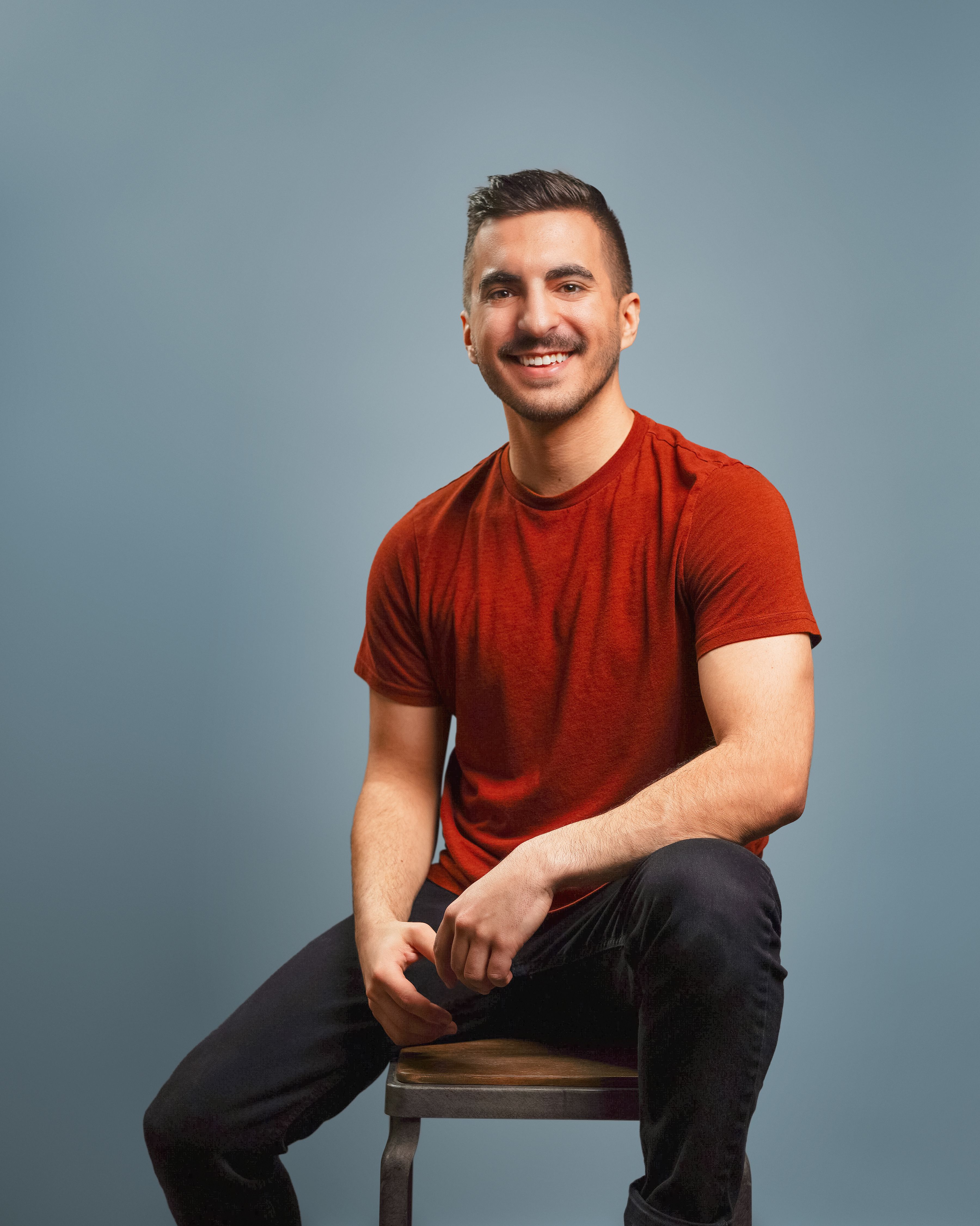 portrait-of-a-man-in-a-red-shirt-free-stock-photo