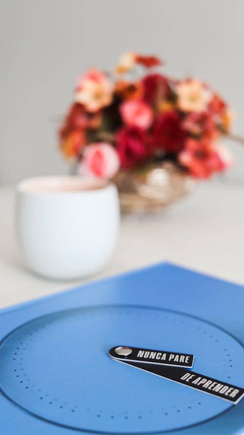 Blue Silicone Tray on Table with Bouquet of Flowers