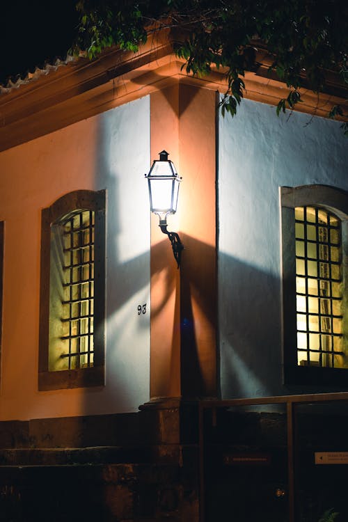 Lamp Light in House Corner at Night