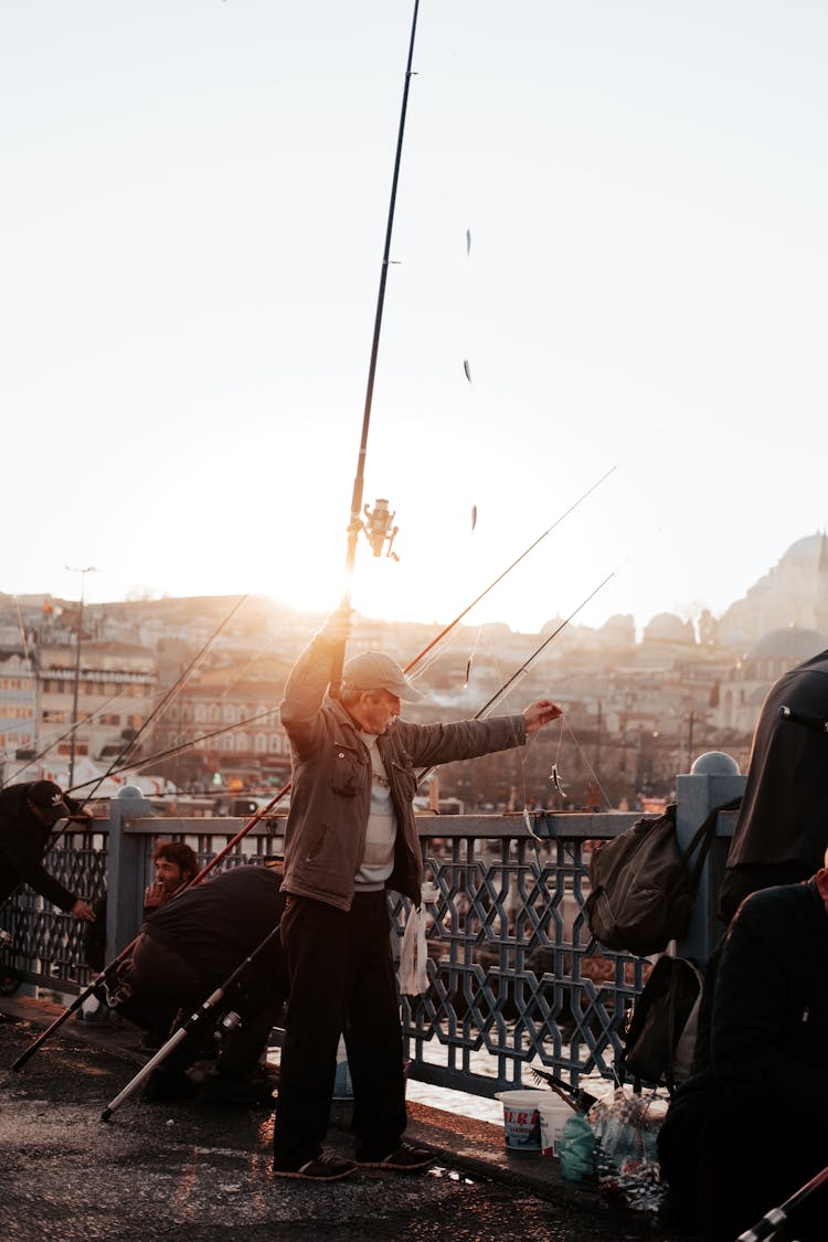 Man Using Fishing Rod