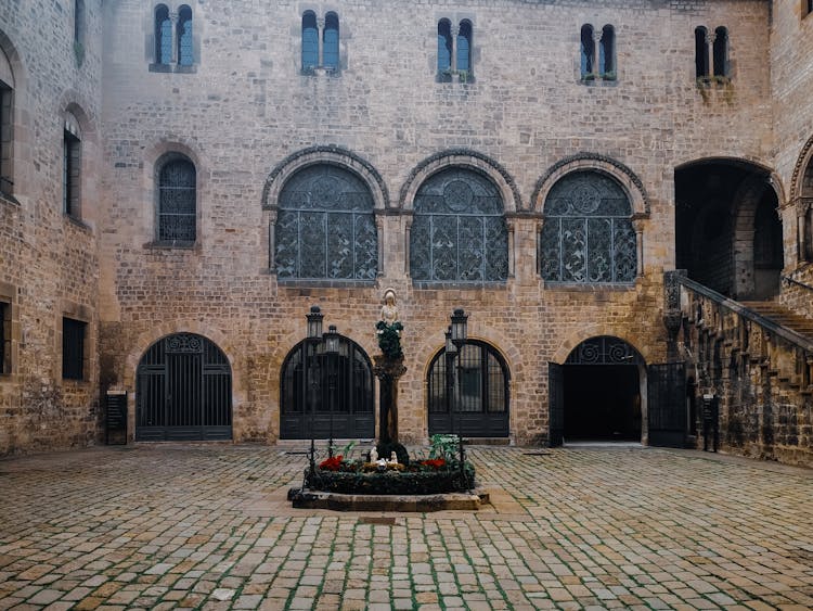 Figurine On Castle Courtyard