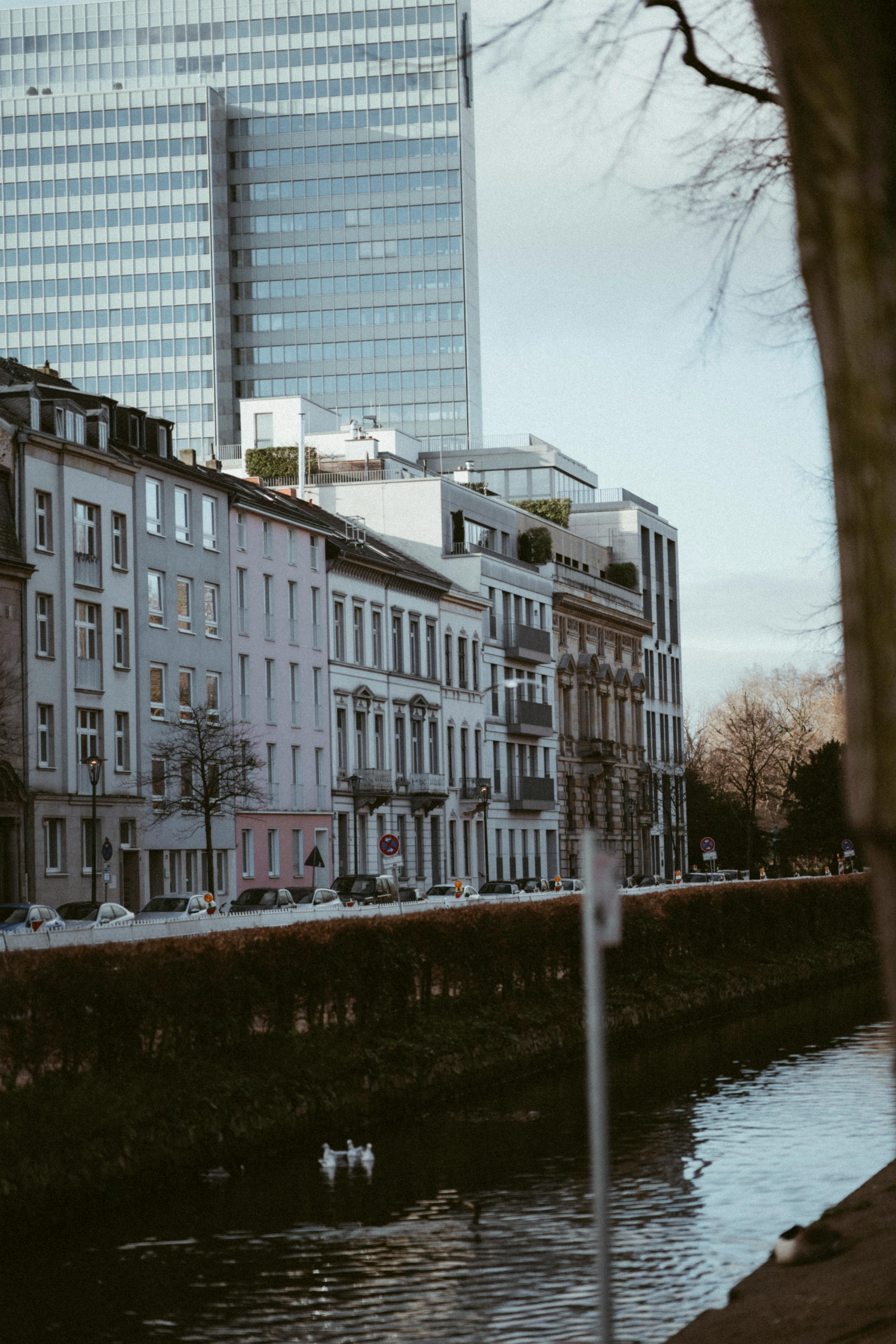 Buildings on Riverbank in Town · Free Stock Photo