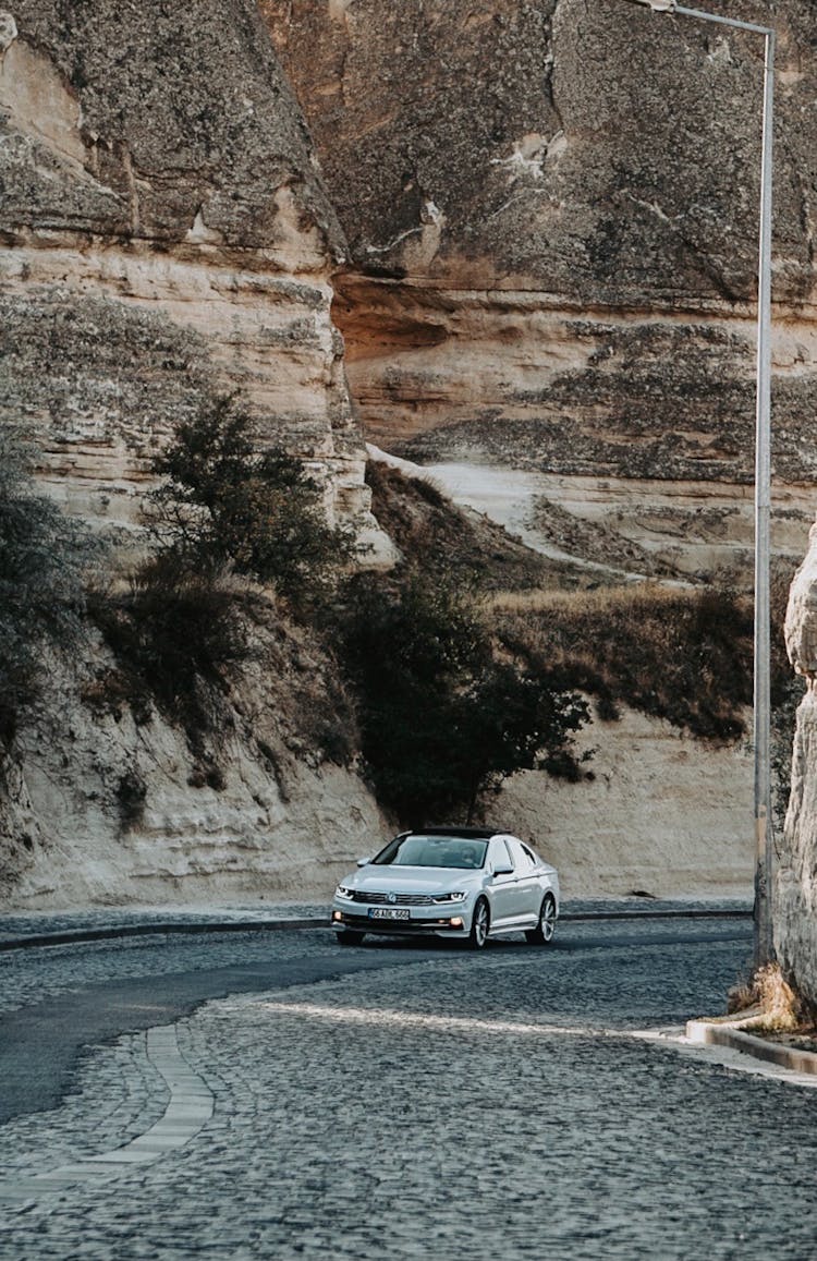 Car On Road Near Rock