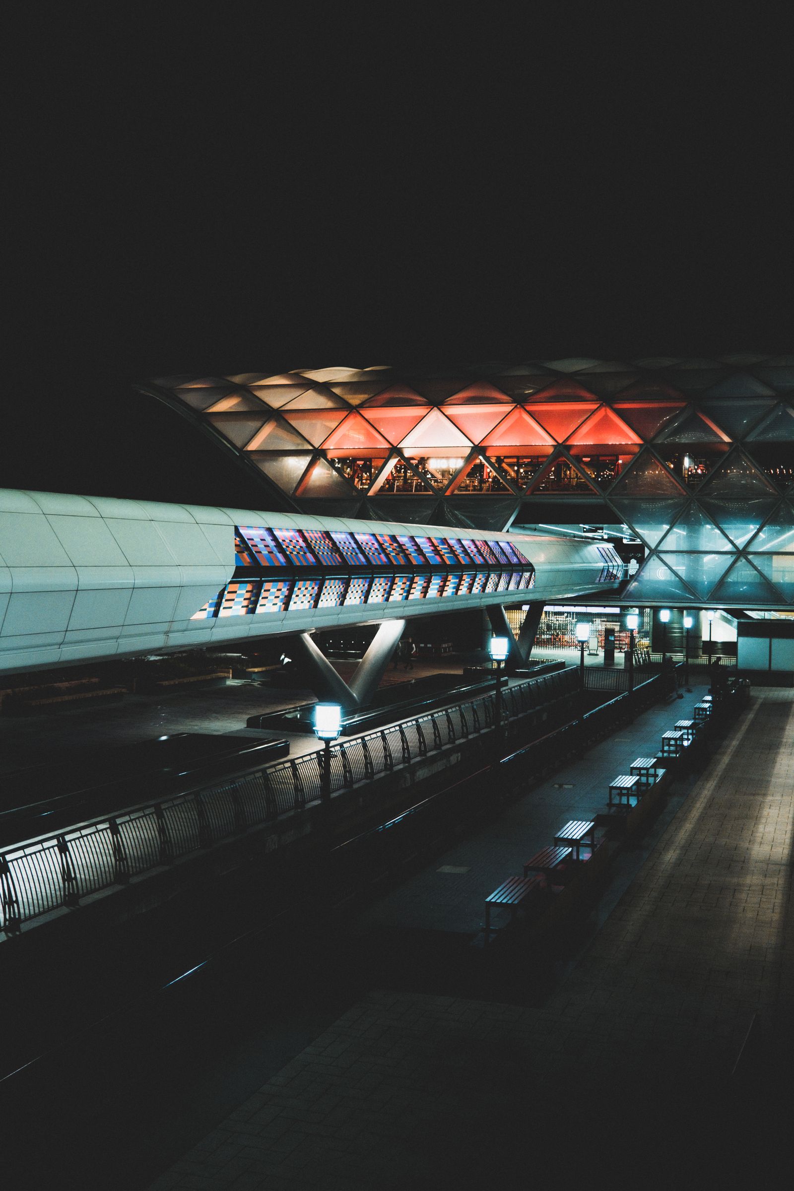 Quiet airport terminal at night with dimmed lighting