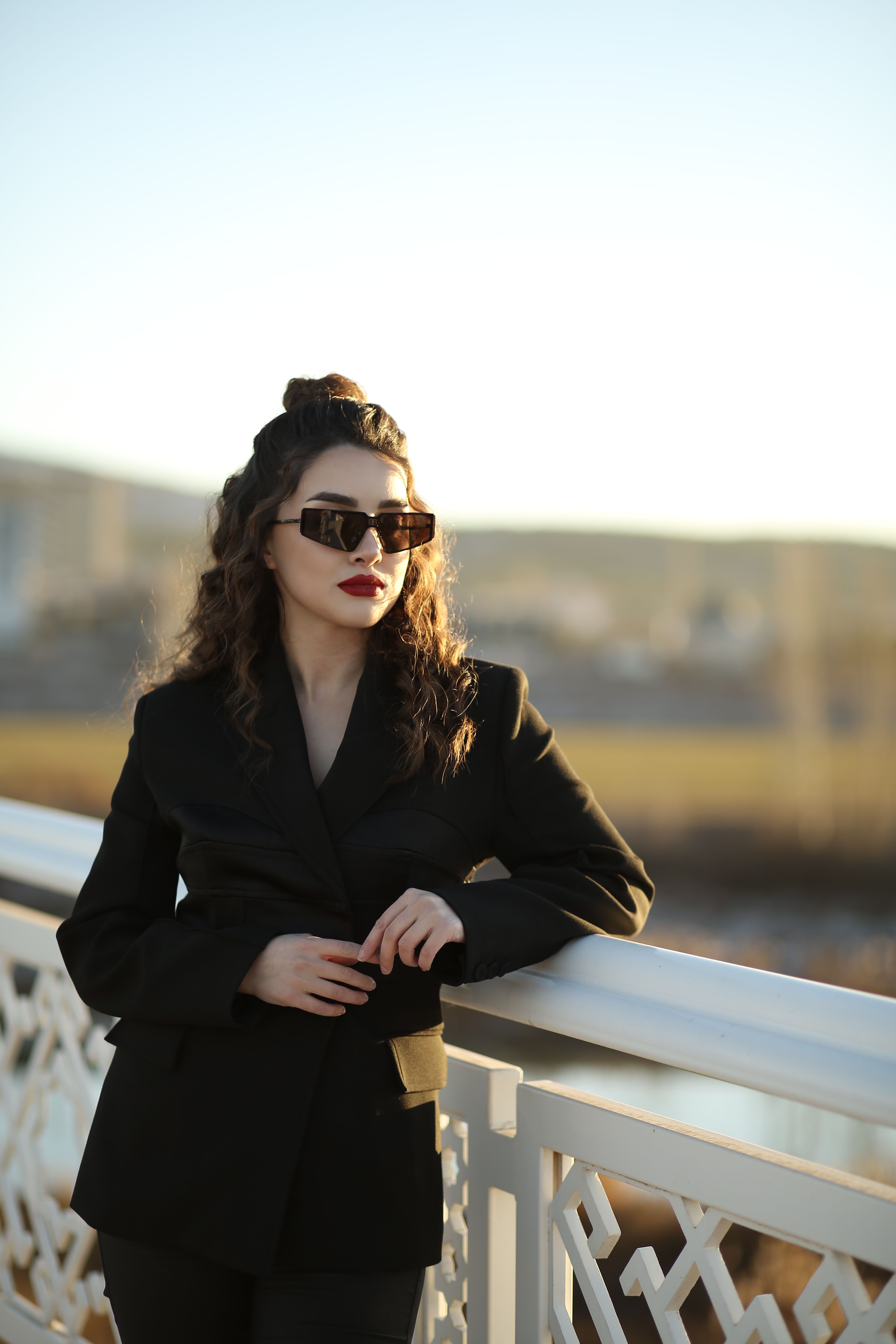A Woman in Black Clothes Wearing Sunglasses · Free Stock Photo