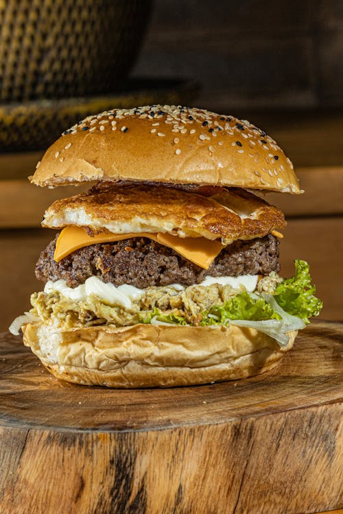 Tasty Burger on Wooden Board