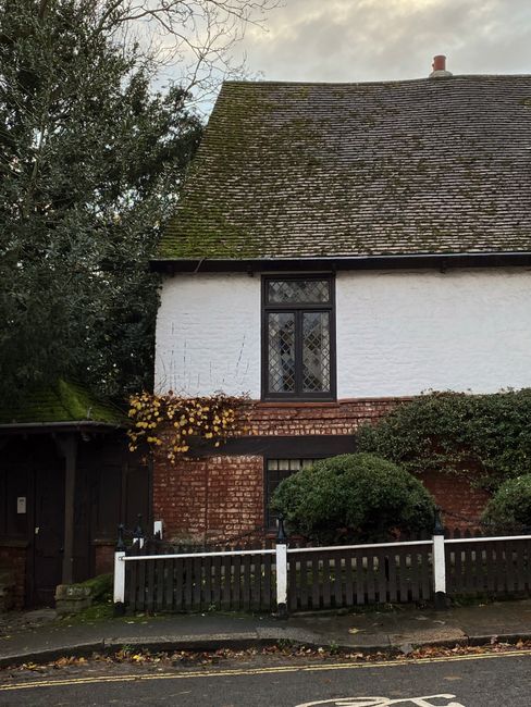 Quaint English cottage exterior in Greater London, showcasing historic architecture.