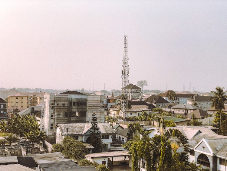 Industrial Tower And Buildings Roofs In City