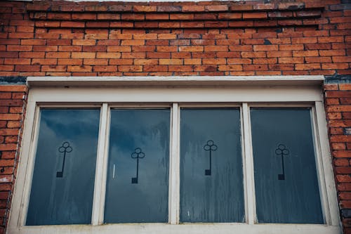 Building with Brick Wall and Glass Windows