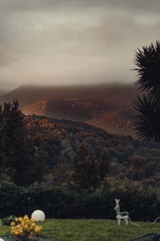 Sunlit hills and forested landscape in Ajaccio, Corse, France, with a tranquil mountain view. - Fotografer Sidoarjo