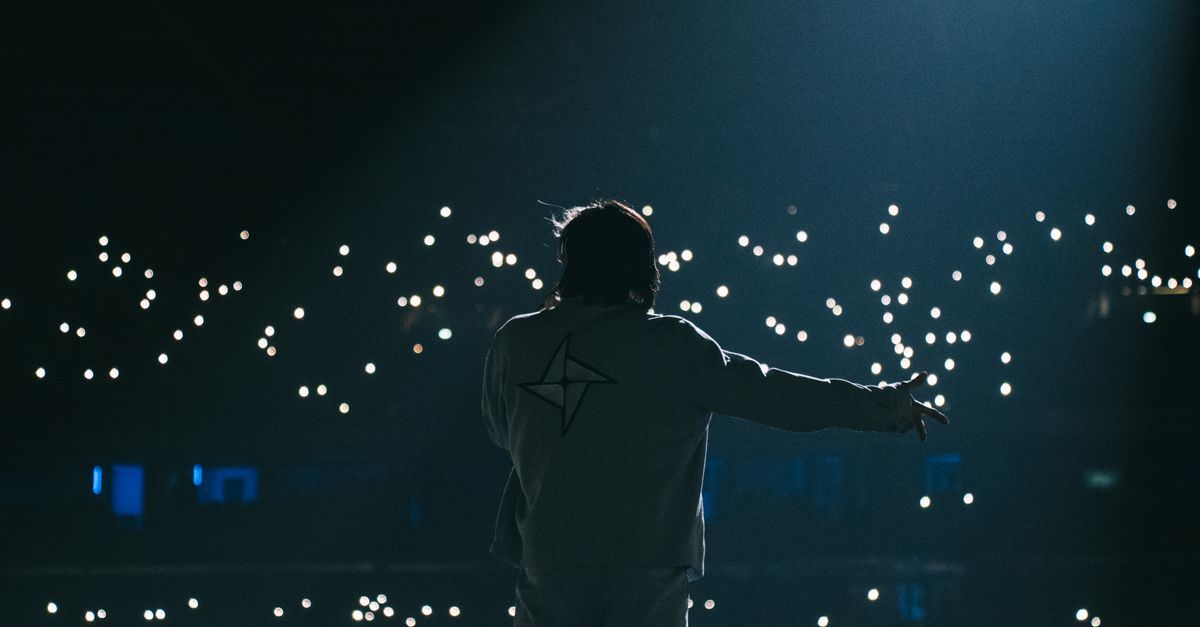 On Stage Back View Rapper Back View of Singer on Stage · Free Stock Photo