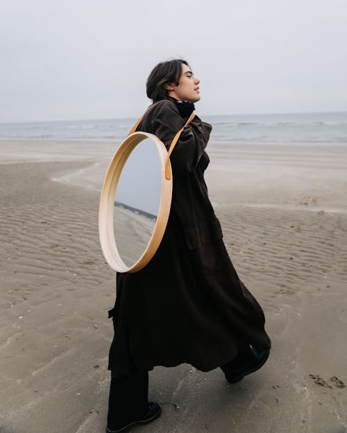 Man Walking with Mirror