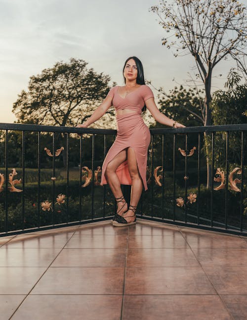 Beautiful Woman Leaning on Railing