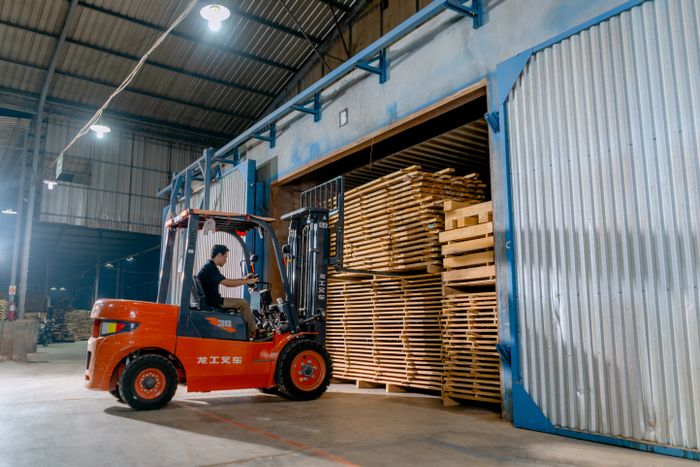 Forklift operator representing logistics industry