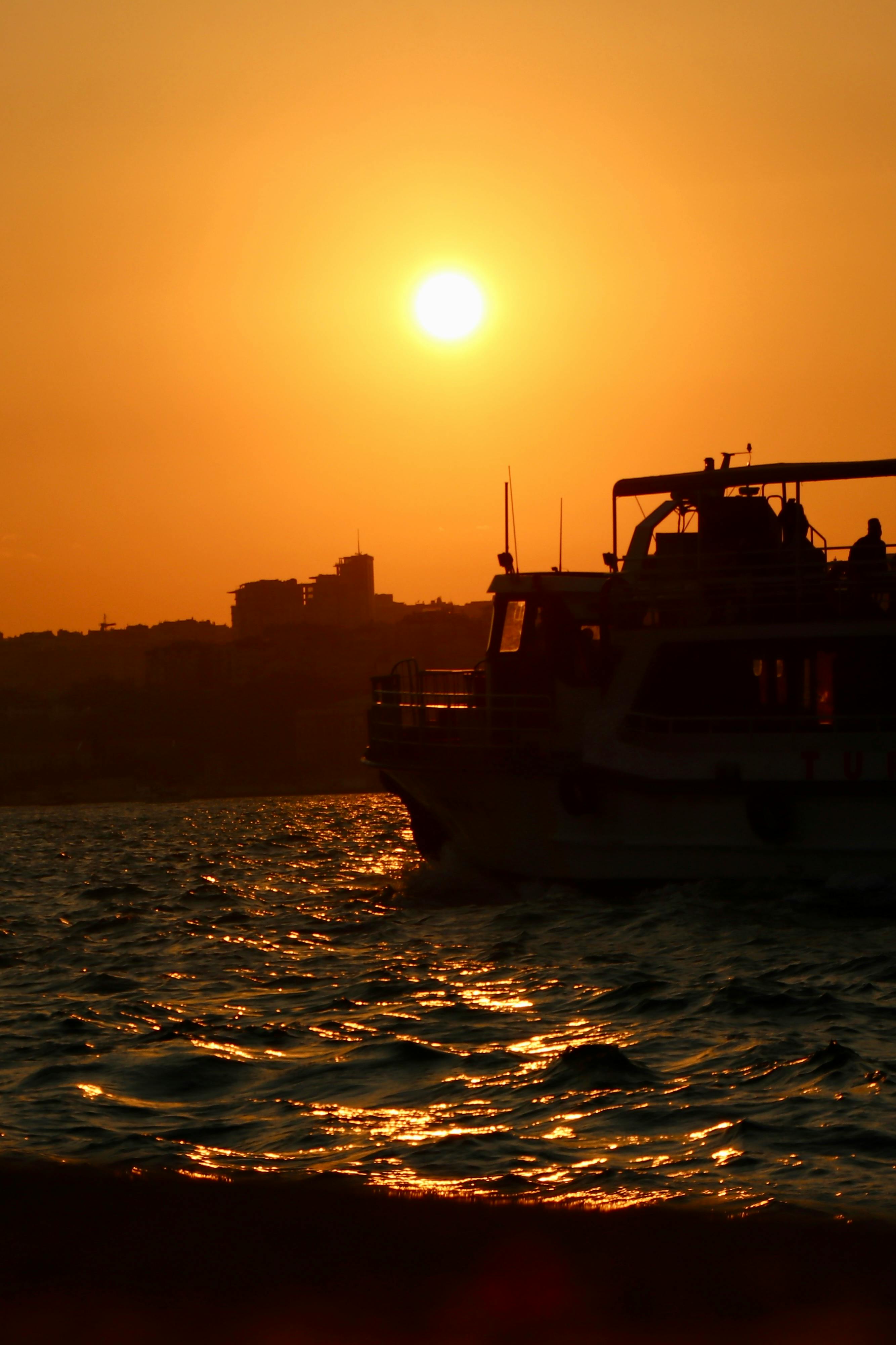 Ferry Sailing at Sunset · Free Stock Photo