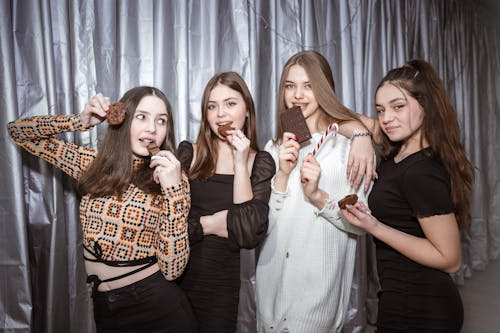 Women Eating Chocolate Chip Cookies