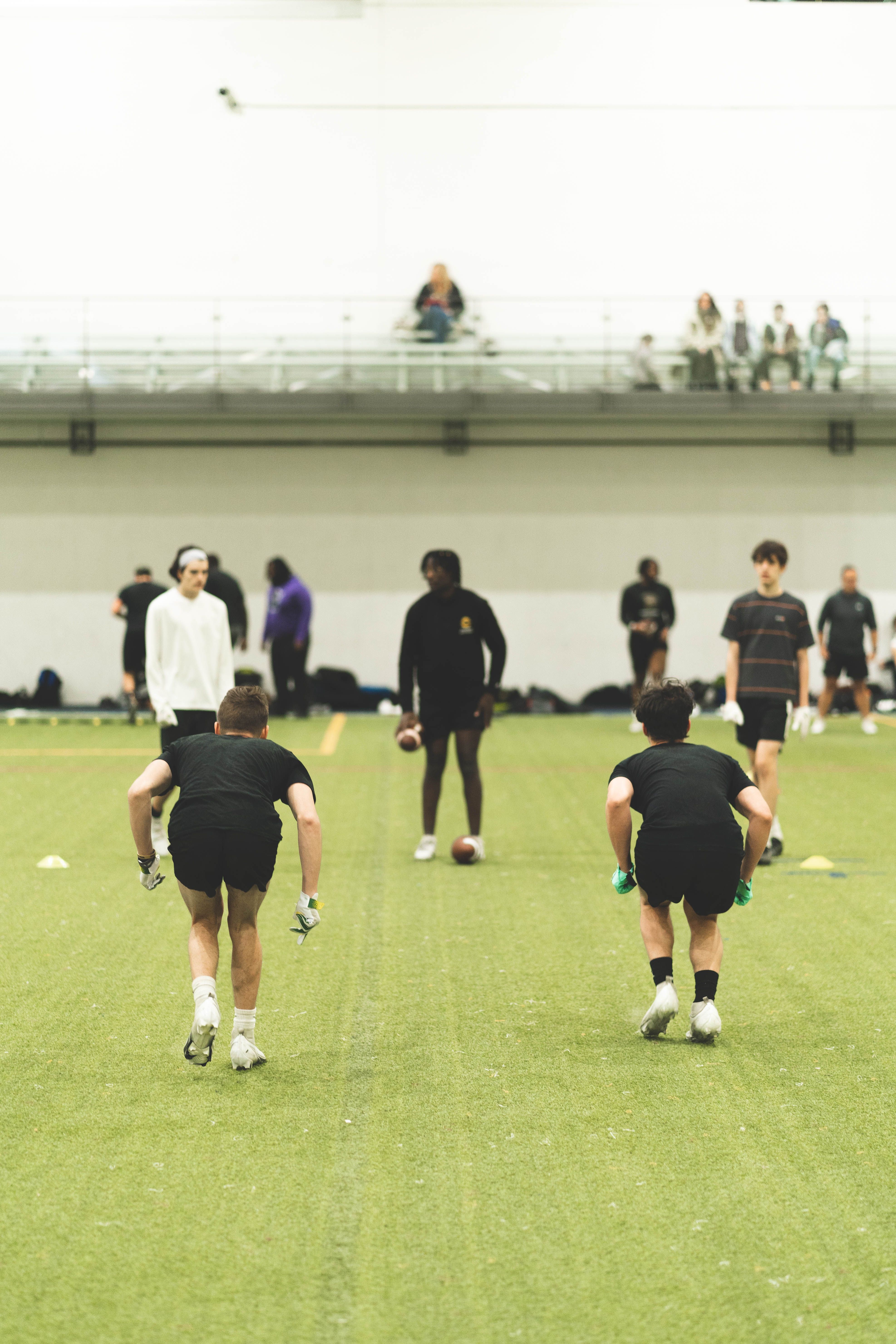Boys in Uniforms Training on Field · Free Stock Photo