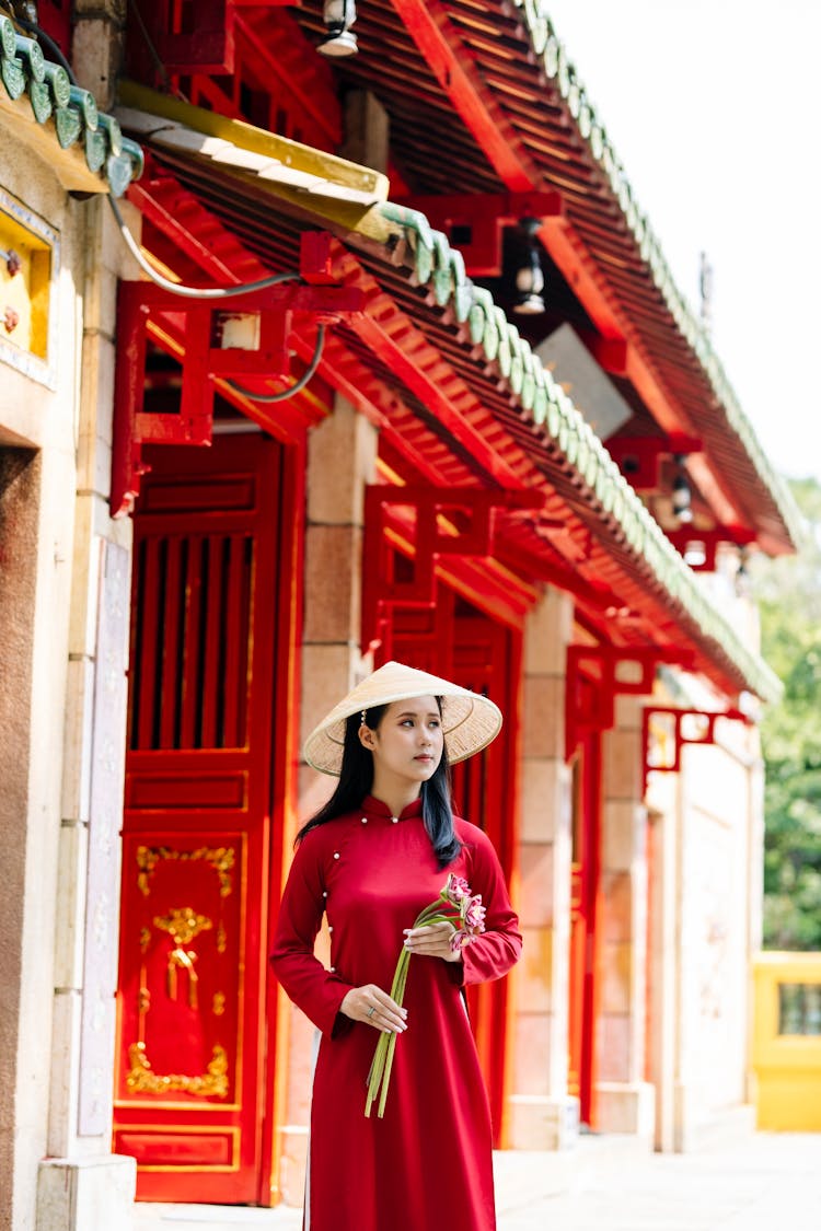 Woman In Red Dress In Pagoda