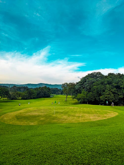 Free Cloud and Blue Sky over Golf Course Stock Photo